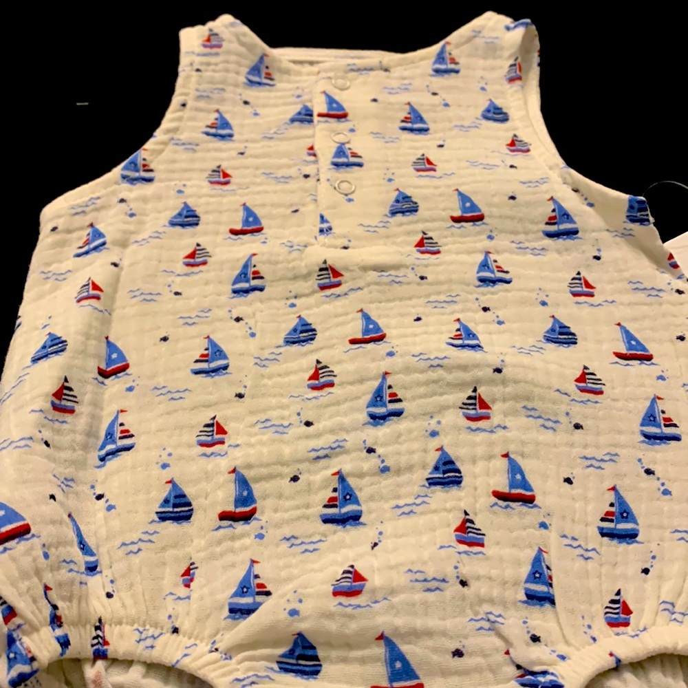 Little boys onesies with sailboats.